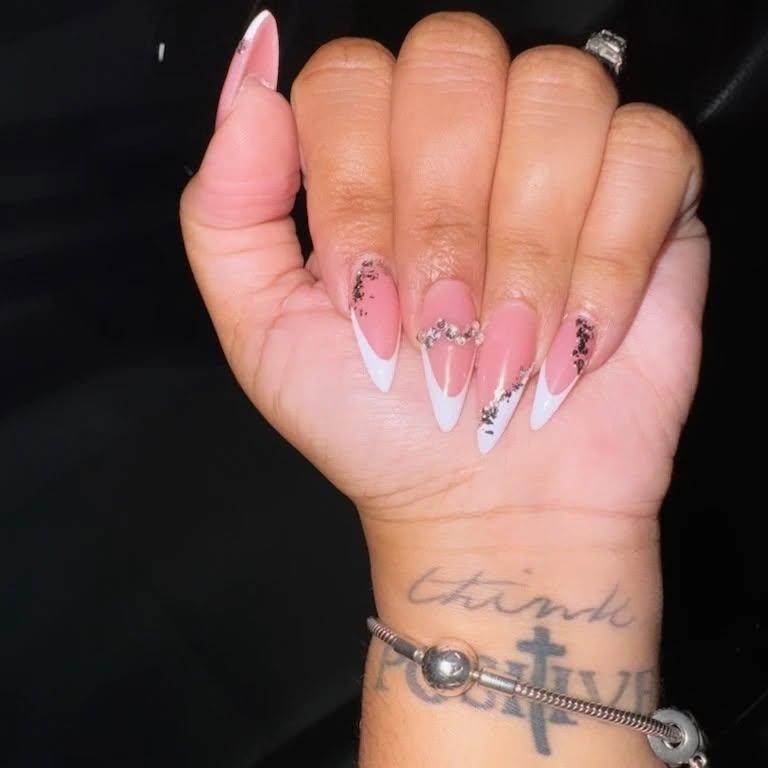Nude and white French with glitter accents