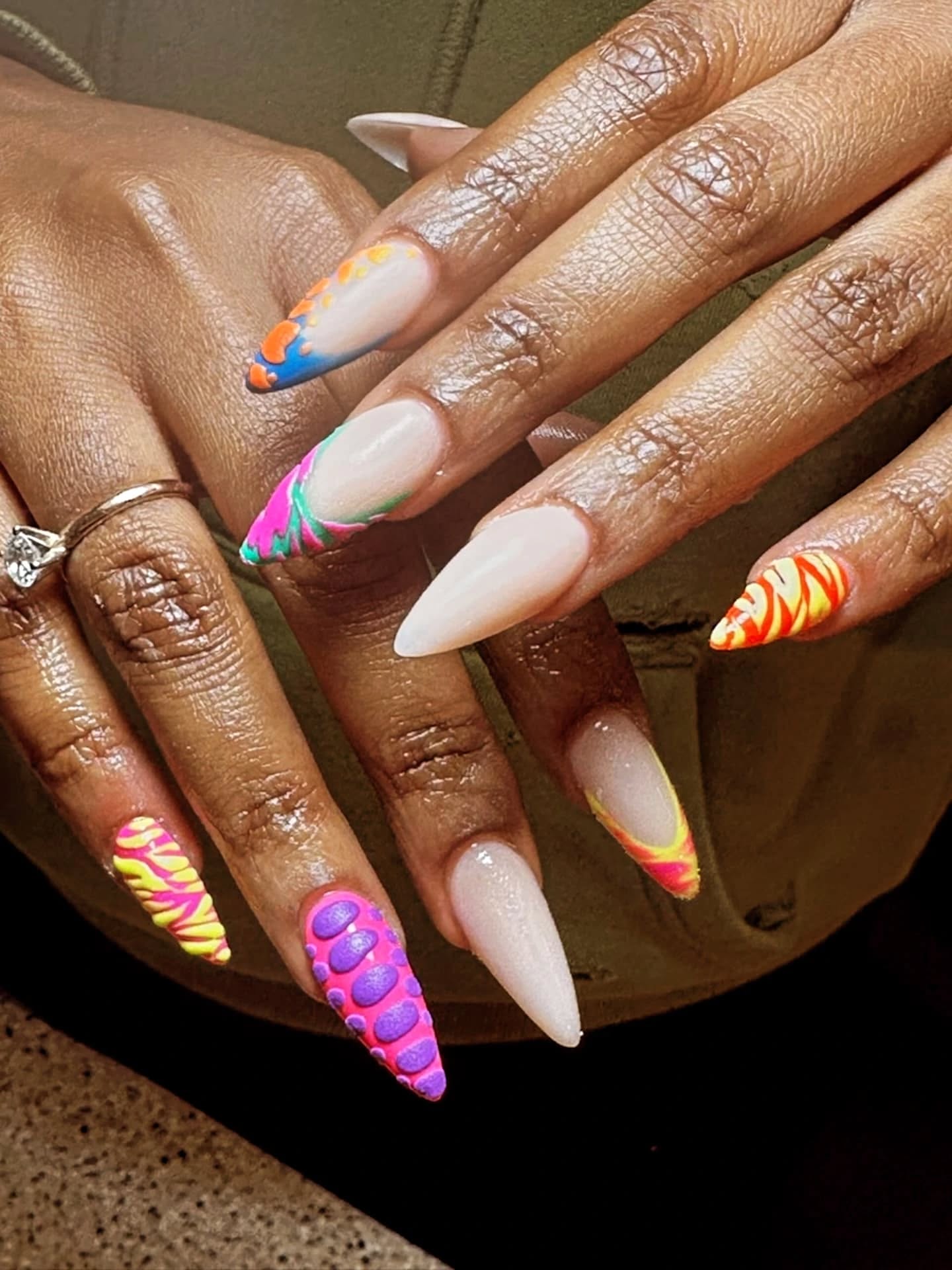 Neon abstract nail art on stiletto acrylic set